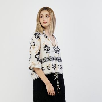 Blusa beige con stampa