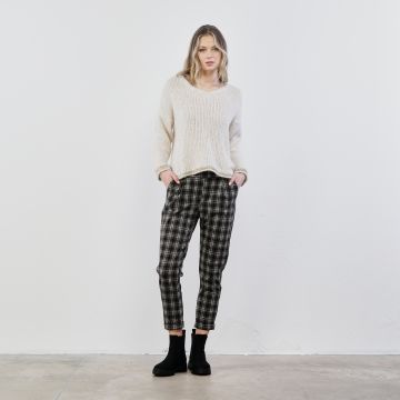 Pantaloni neri lunghi in stampa check con tasche