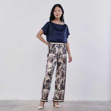 Pantaloni beige e blu in fantasia floreale Alesya da donna