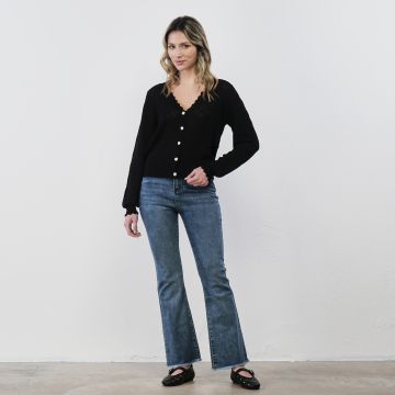 Jeans azzurri da donna con orlo sfrangiato