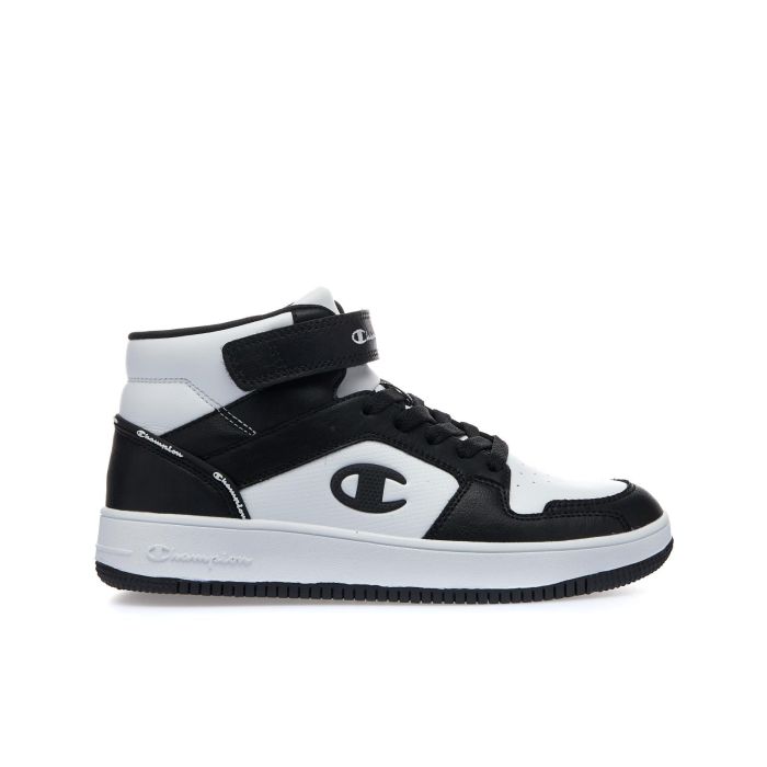 Sneakers alte ragazzo da basket nere e bianche Rebound mid con strappo