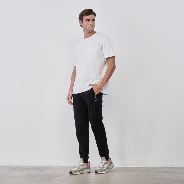 Pantaloni sportivi neri da uomo con logo e polsini