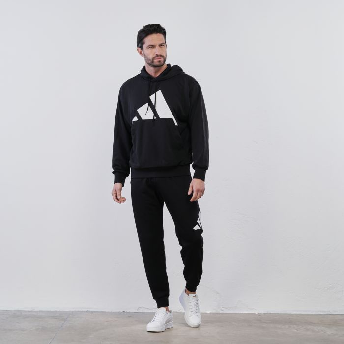 Pantaloni neri sportivi da uomo con maxi logo e polsini