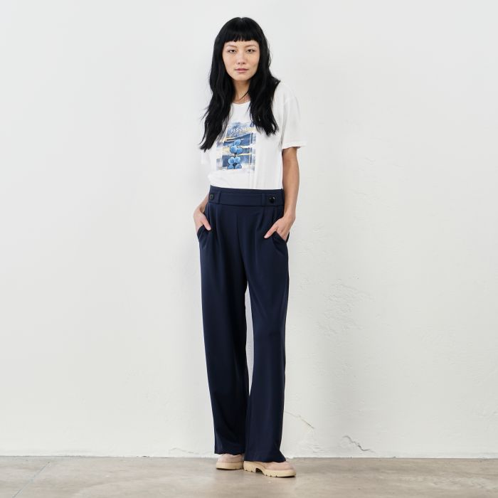 Pantaloni blu ampi con bottoni decorativi