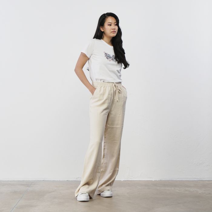 Pantaloni beige ampi da donna con coulisse in vita