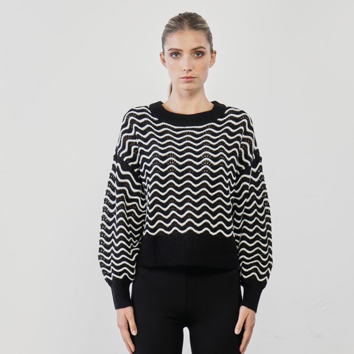 Maglioncino bianco e nero in fantasia optical