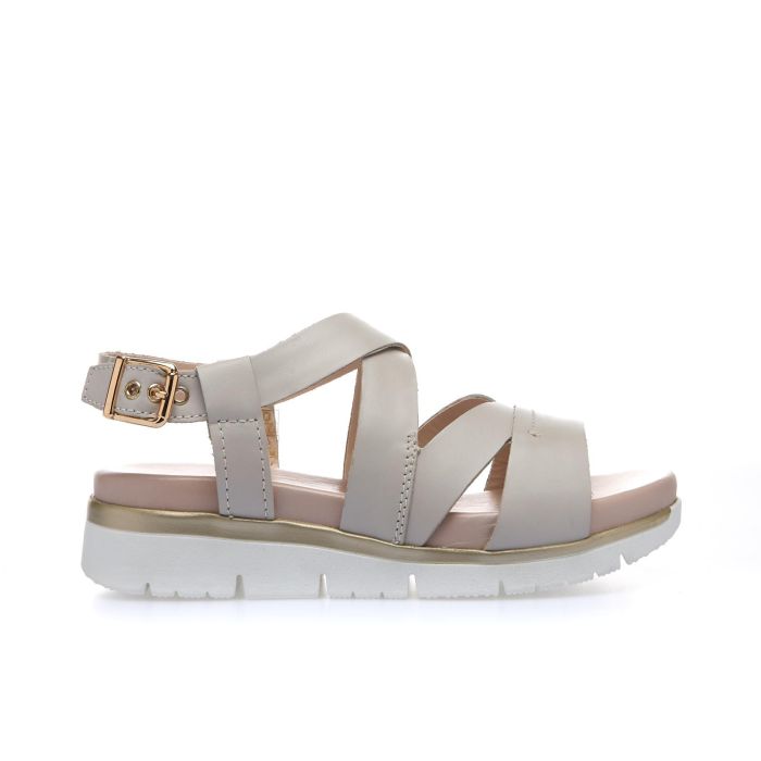Sandali casual beige in pelle con zeppa e cinturini a incrocio