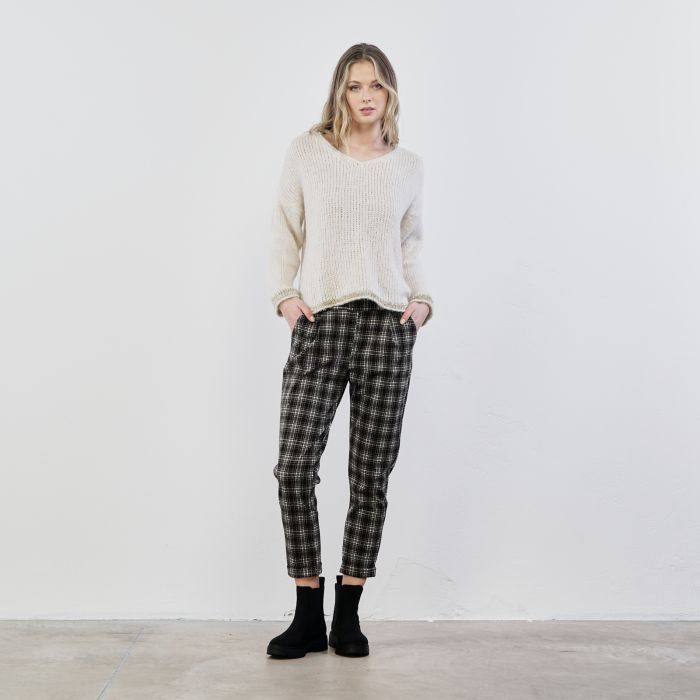 Pantaloni neri lunghi in stampa check con tasche