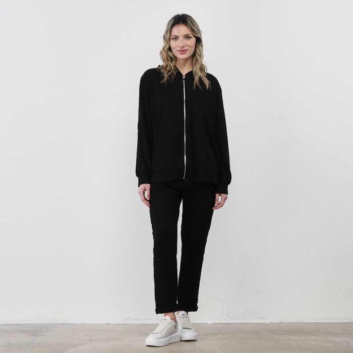 Pantaloni neri morbidi da donna con bande laterali effetto pizzo