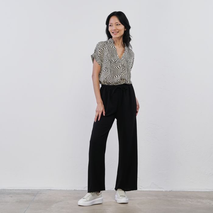 Pantaloni neri lunghi morbidi da donna con coulisse in vita