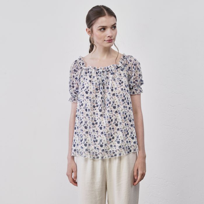 Blusa bianca e blu da donna in fantasia fiori con scollo con fiocchetto