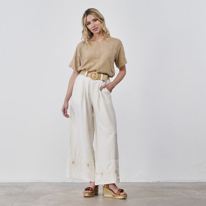 Pantaloni lunghi ampi beige da donna con orlo ricamato