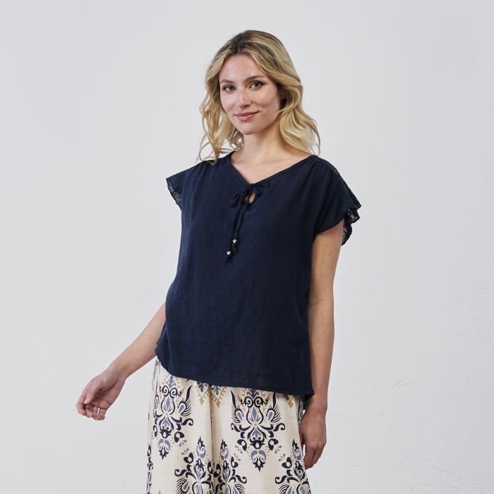 Top blu da donna senza maniche con dettaglio volant e laccio