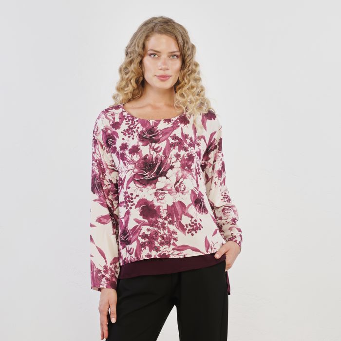 Maglia bianca con fantasia floreale