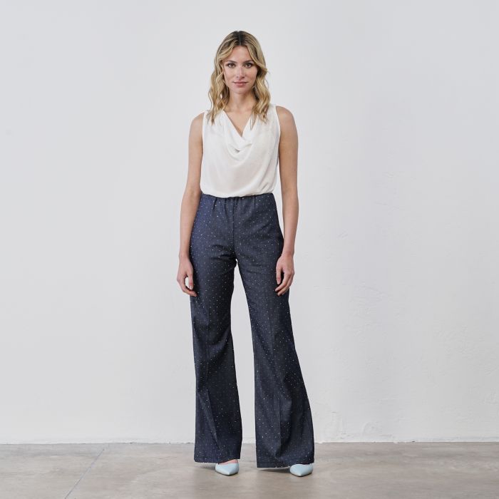 Pantaloni blu a zampa in denim da donna con strass