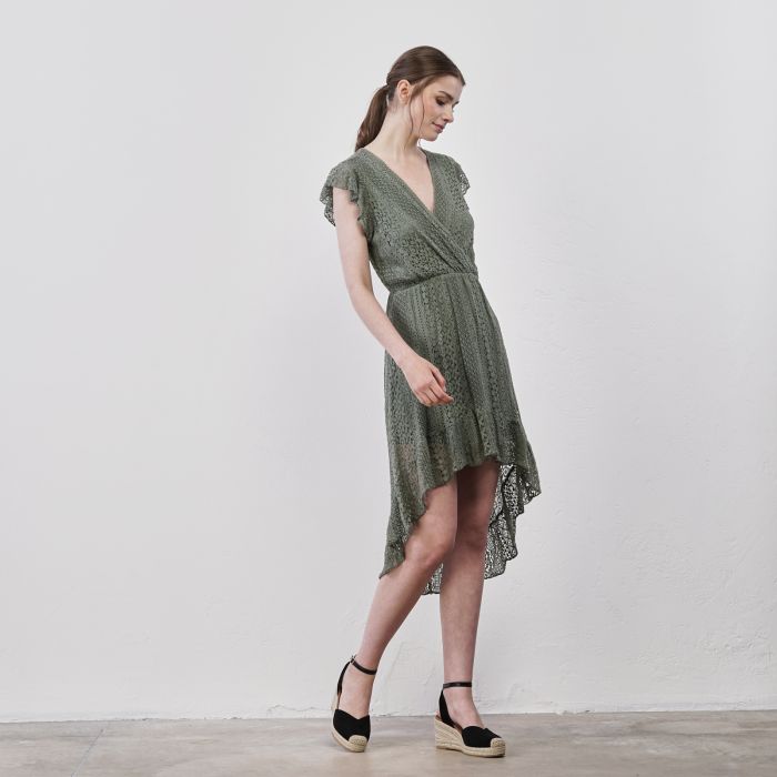 Abito verde corto asimmetrico da donna in tessuto effetto pizzo