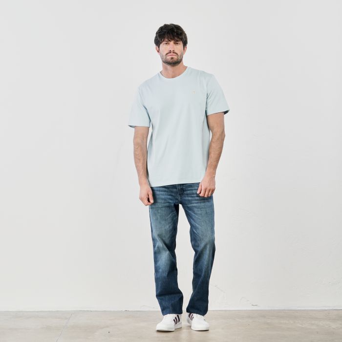 Jeans blu effetto stone washed con tasche