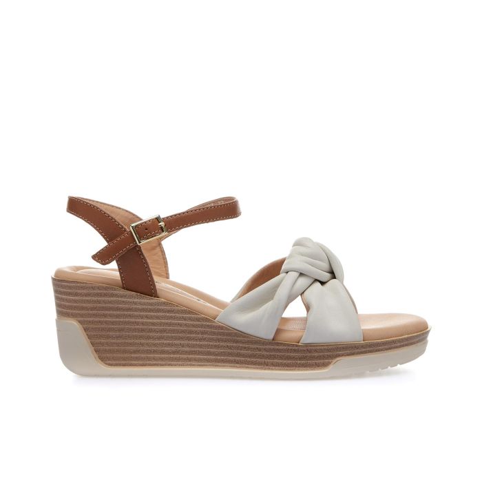 Sandali bianchi in pelle con zeppa e nodo