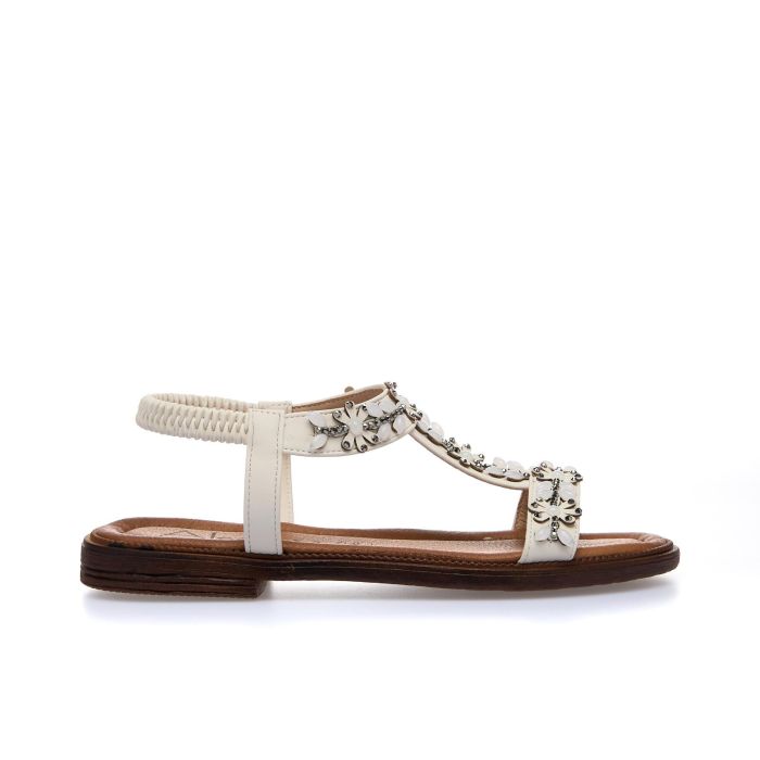 Sandali bassi bianchi con applicazioni e cinturino elasticizzato