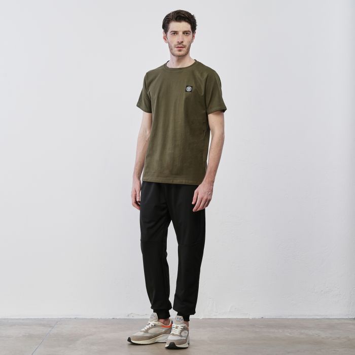 Pantaloni sportivi neri da uomo con polsini