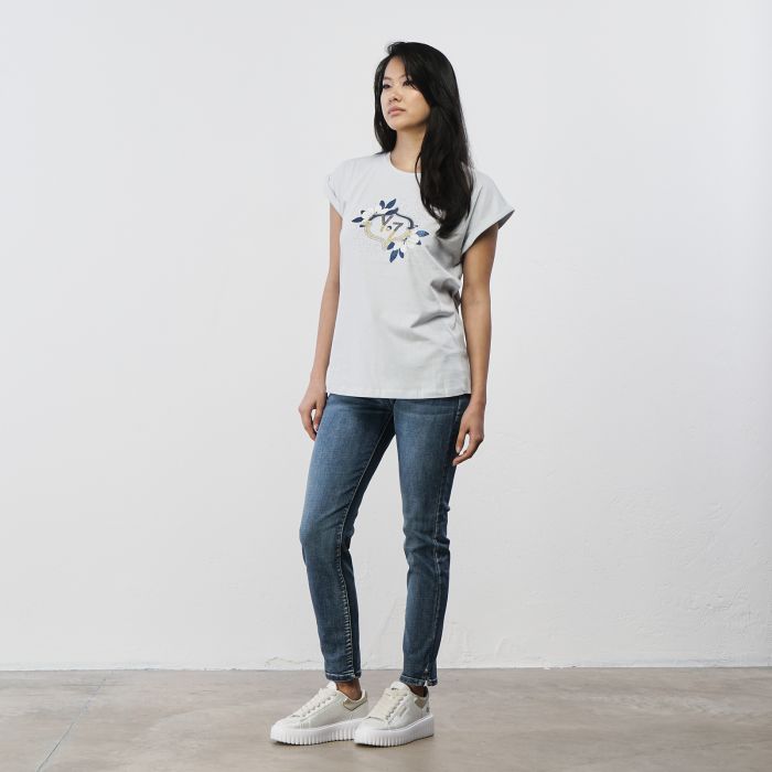 Jeans blu da donna con orlo con strass e piccolo spacco