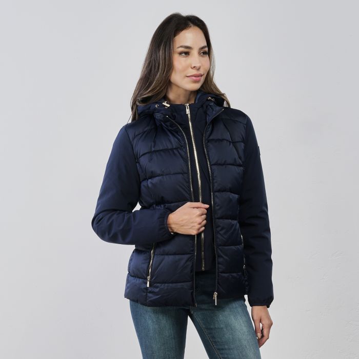 Piumino corto blu da donna con inserto interno e doppia zip