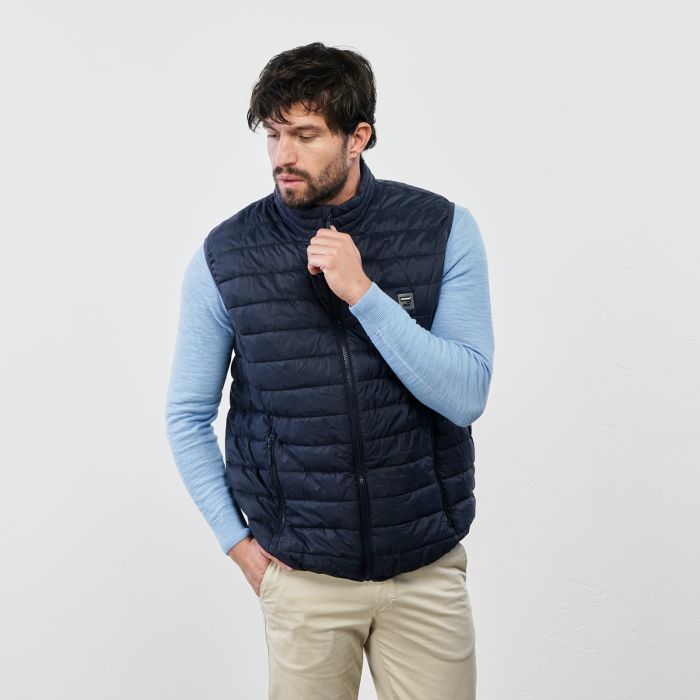 Gilet imbottito blu con tasche e zip